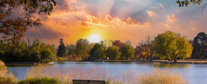 An empty bench at sunset